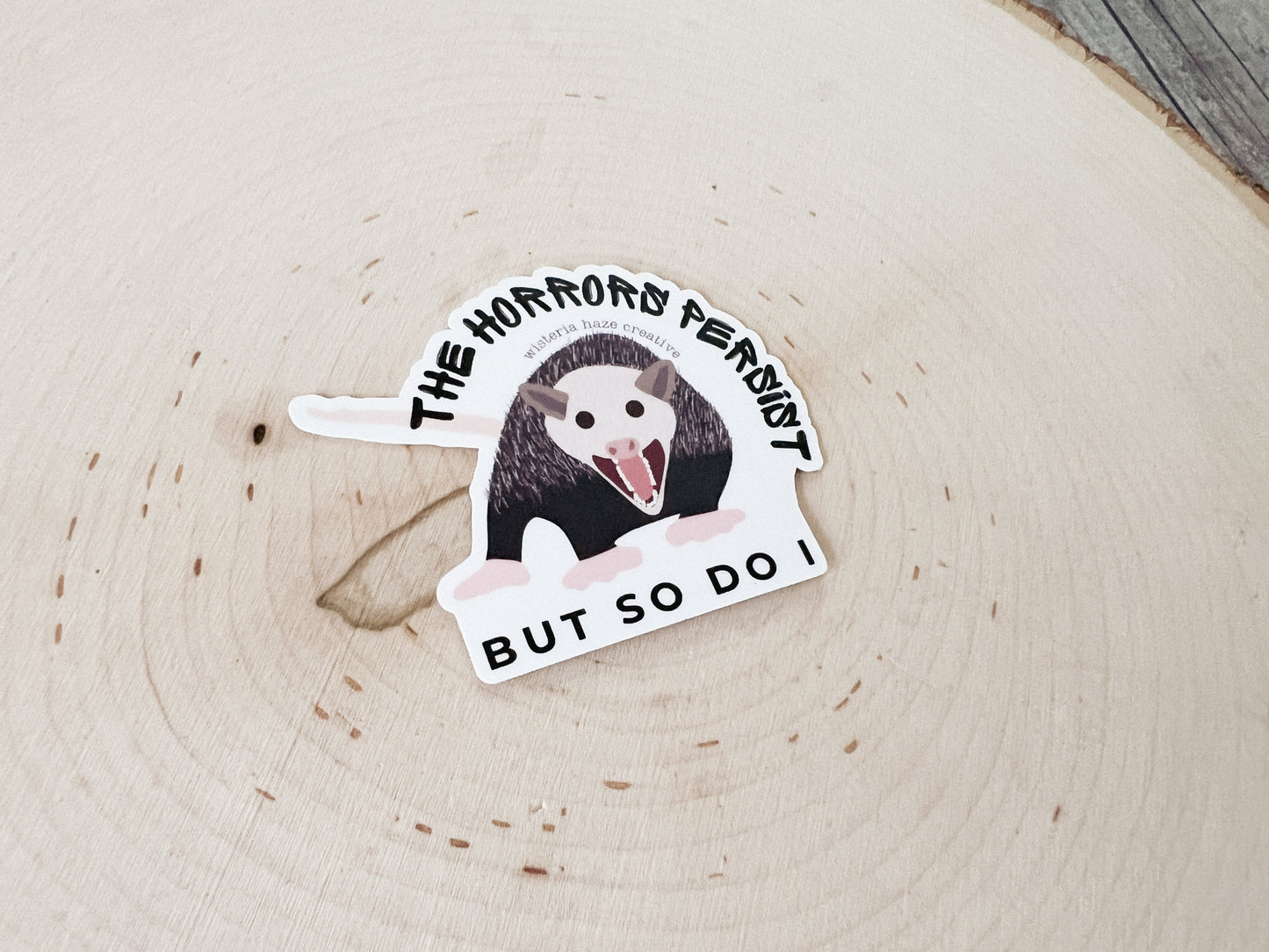 The Horrors Persist, But So Do I Sticker
