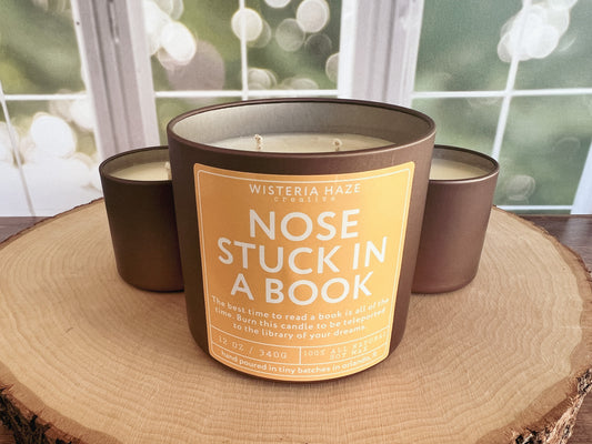 Nose Stuck in a Book Candle